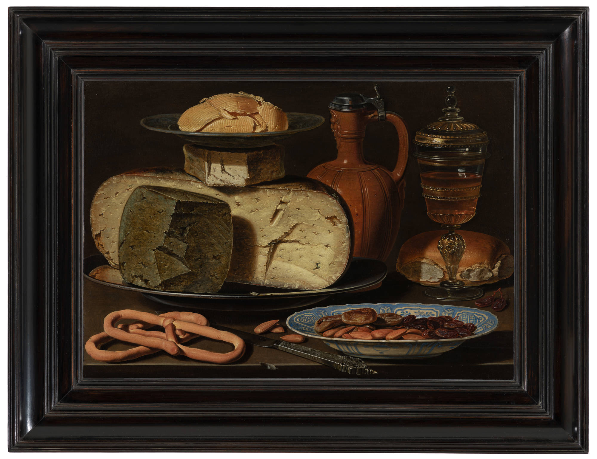 Clara Peeters Stilleven met kazen, amandelen en krakelingen