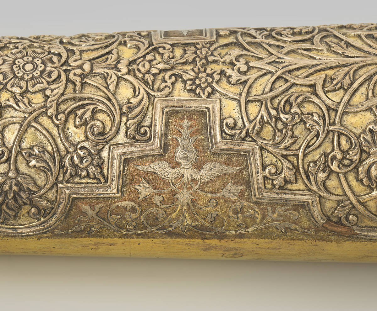 Detail van een gouden kanon.