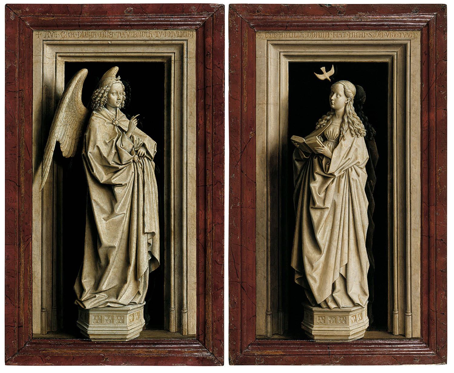 Een diptiek van Jan van Eyck. Het linkerpaneel stelt een marmeren beeld van een engel voor. Op het rechterpaneel staat een marmeren beeld van maria, een marmeren duif vliegt haar tegemoet.